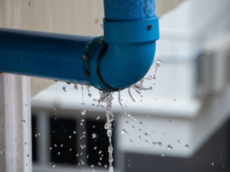 Identify the causes of water leaks to help safeguard your home. An overflowing drainage pipe after a rainstorm.